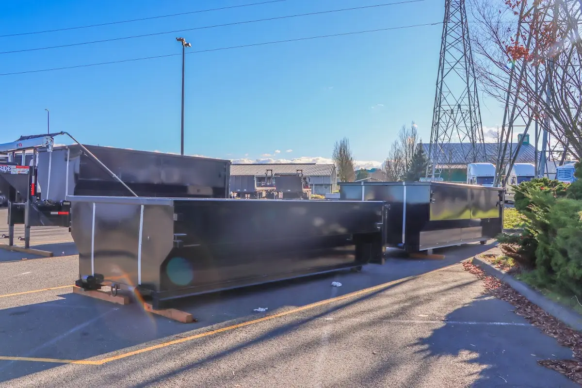 Roll-off dumpster ready for waste disposal at job site for 3 Yard Dumpster Rental in Smithfield